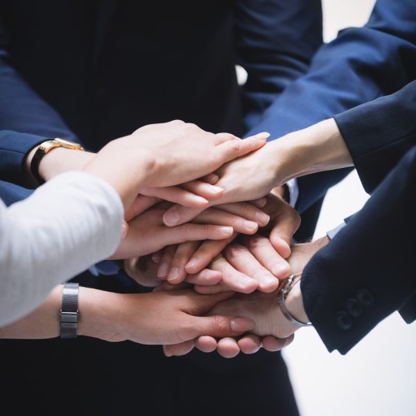 hands-stack-business-people (1)